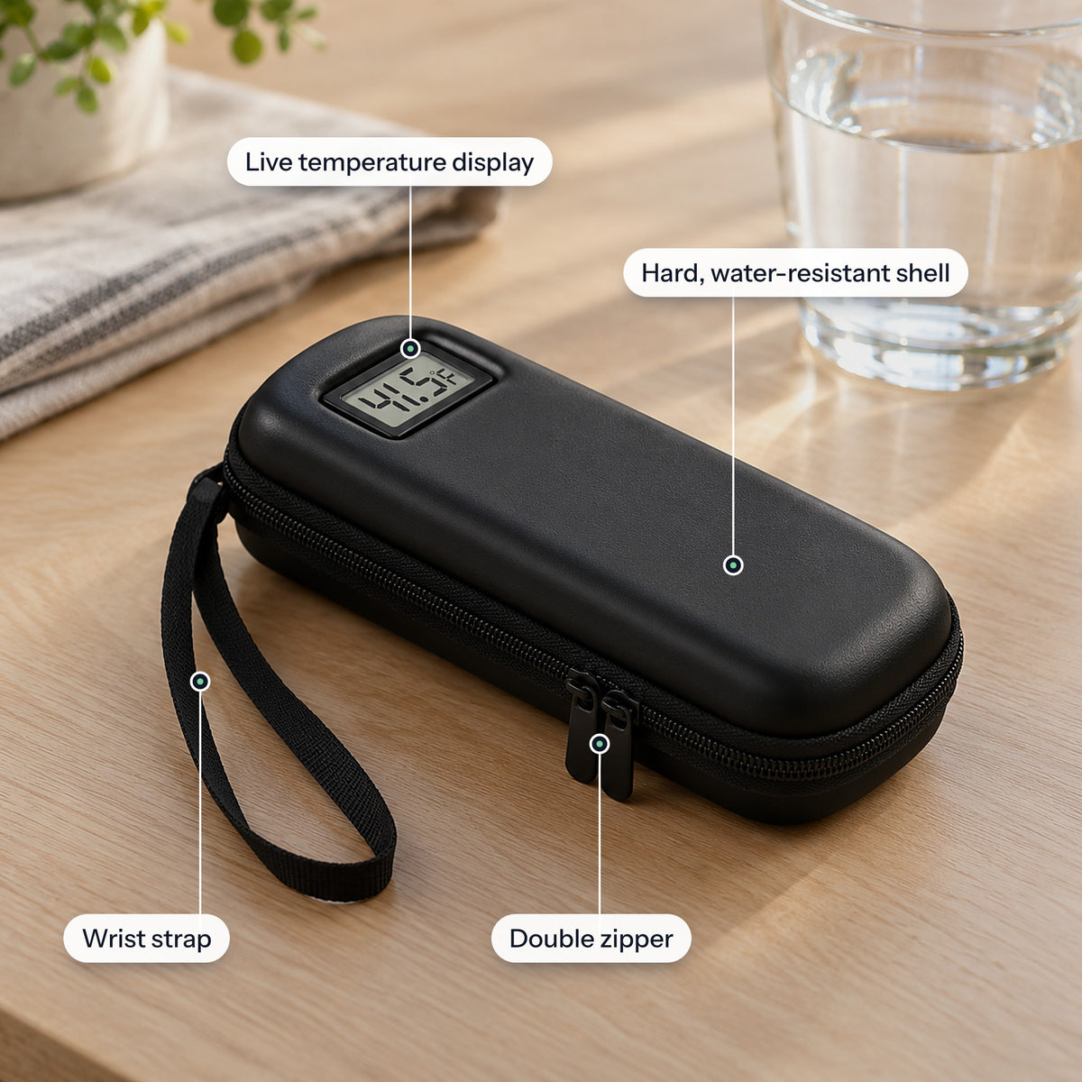 The case's features: live temperature display, hard water-resistant shell, double zipper and wrist strap